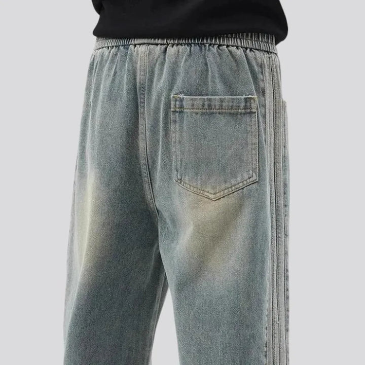 Faded wash and 90s style men's denim joggers