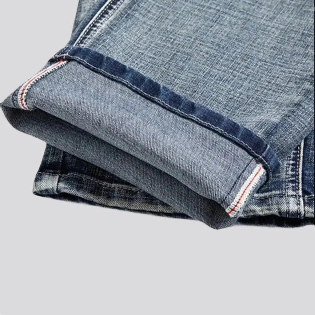 Stonewashed men's sanded jeans