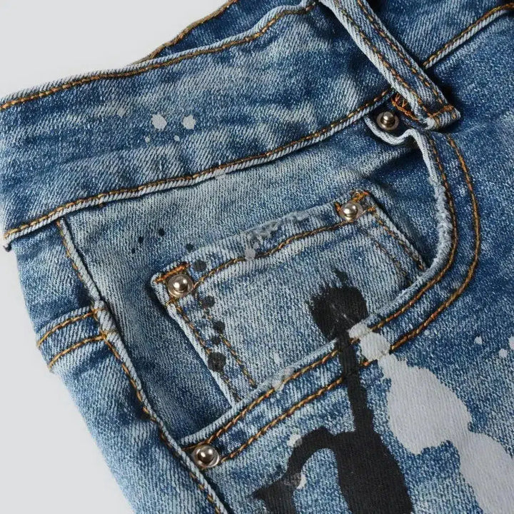 Painted men's light-wash jeans
