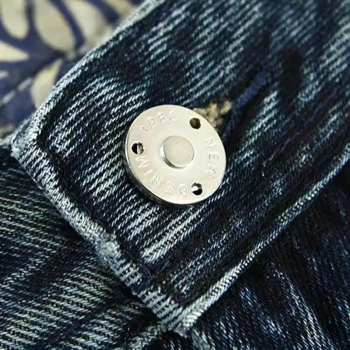 Medium-wash men's mid-waist jeans