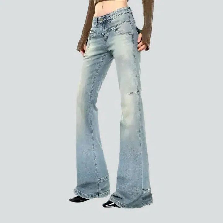 Sanded women's low-waist jeans