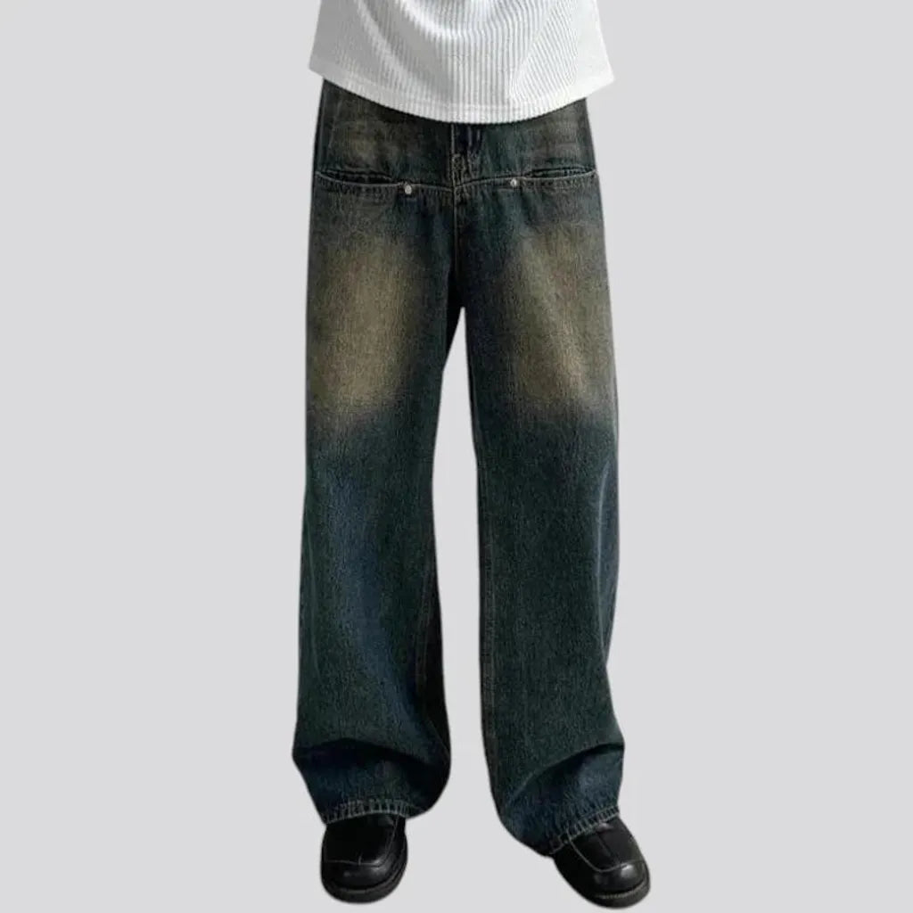 Dark mid rise 90s style men's jeans