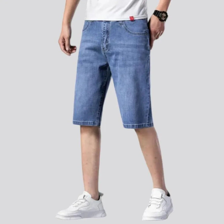 Knee-length men's denim shorts