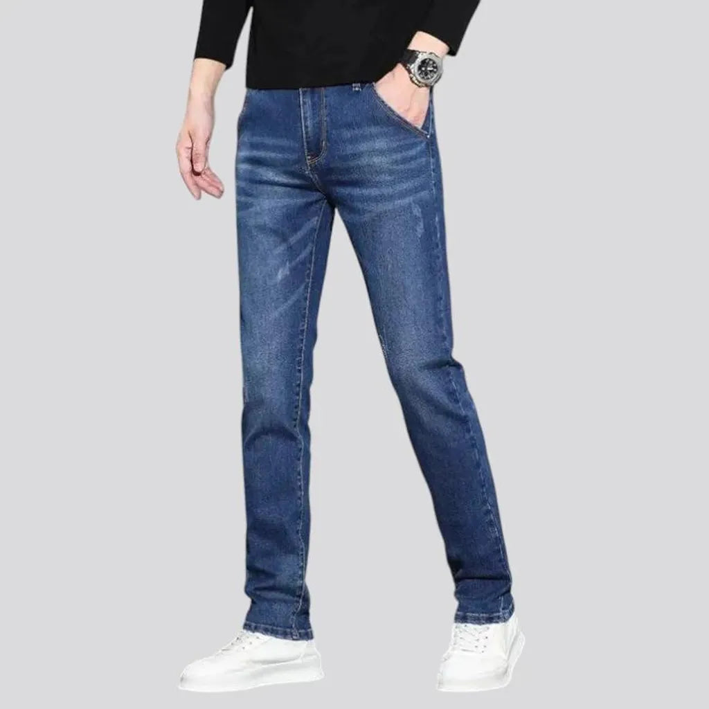 Dark abraded slim fit men's jeans