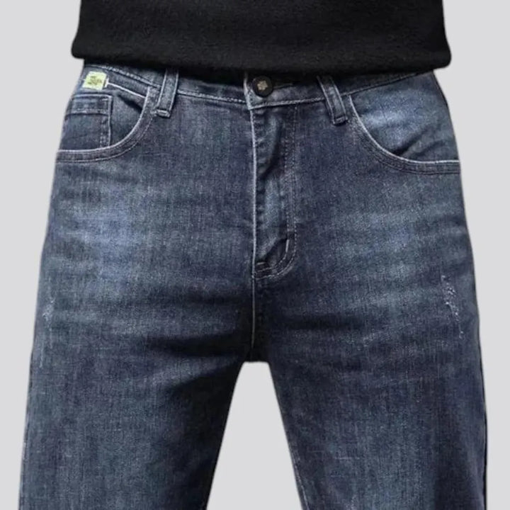 Elastic dark padded jeans for men