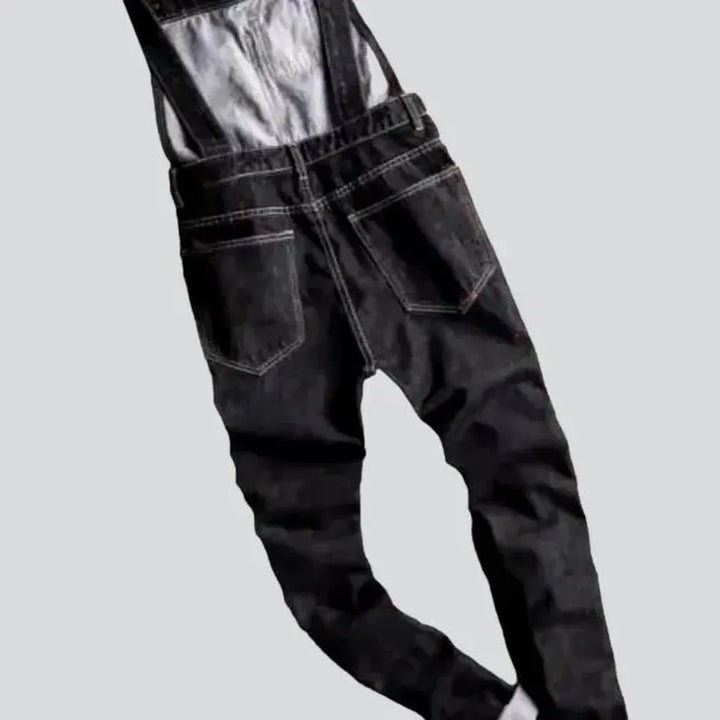 Stonewashed black denim jumpsuit