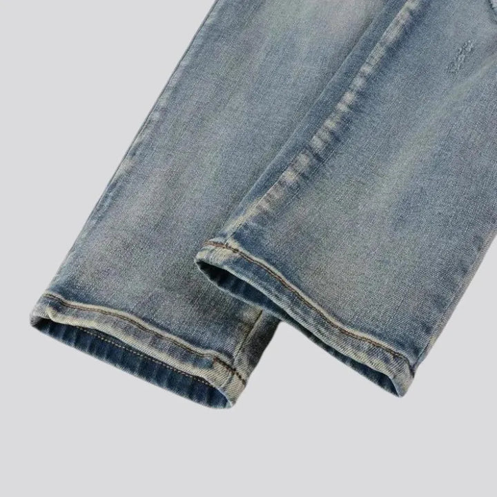 Fashionable ripped men's jeans