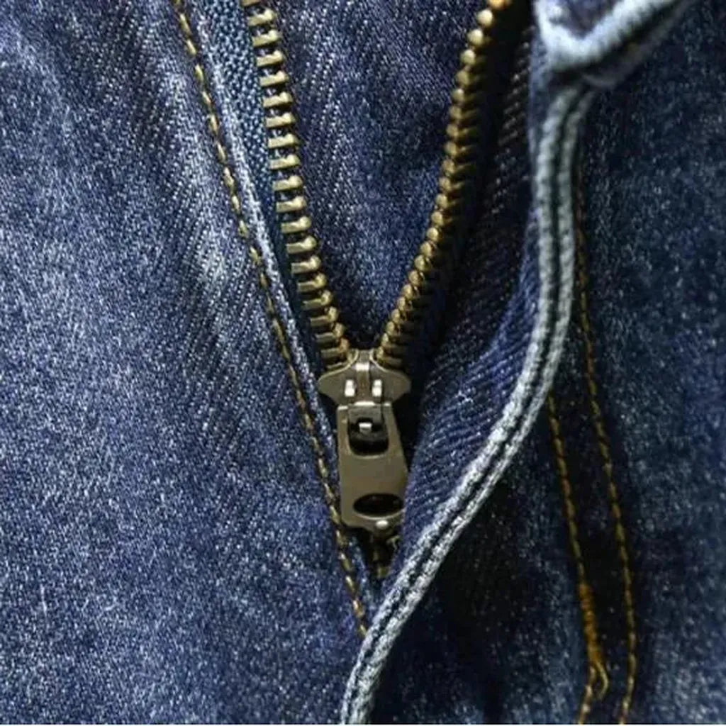 Medium-wash men's loose jeans