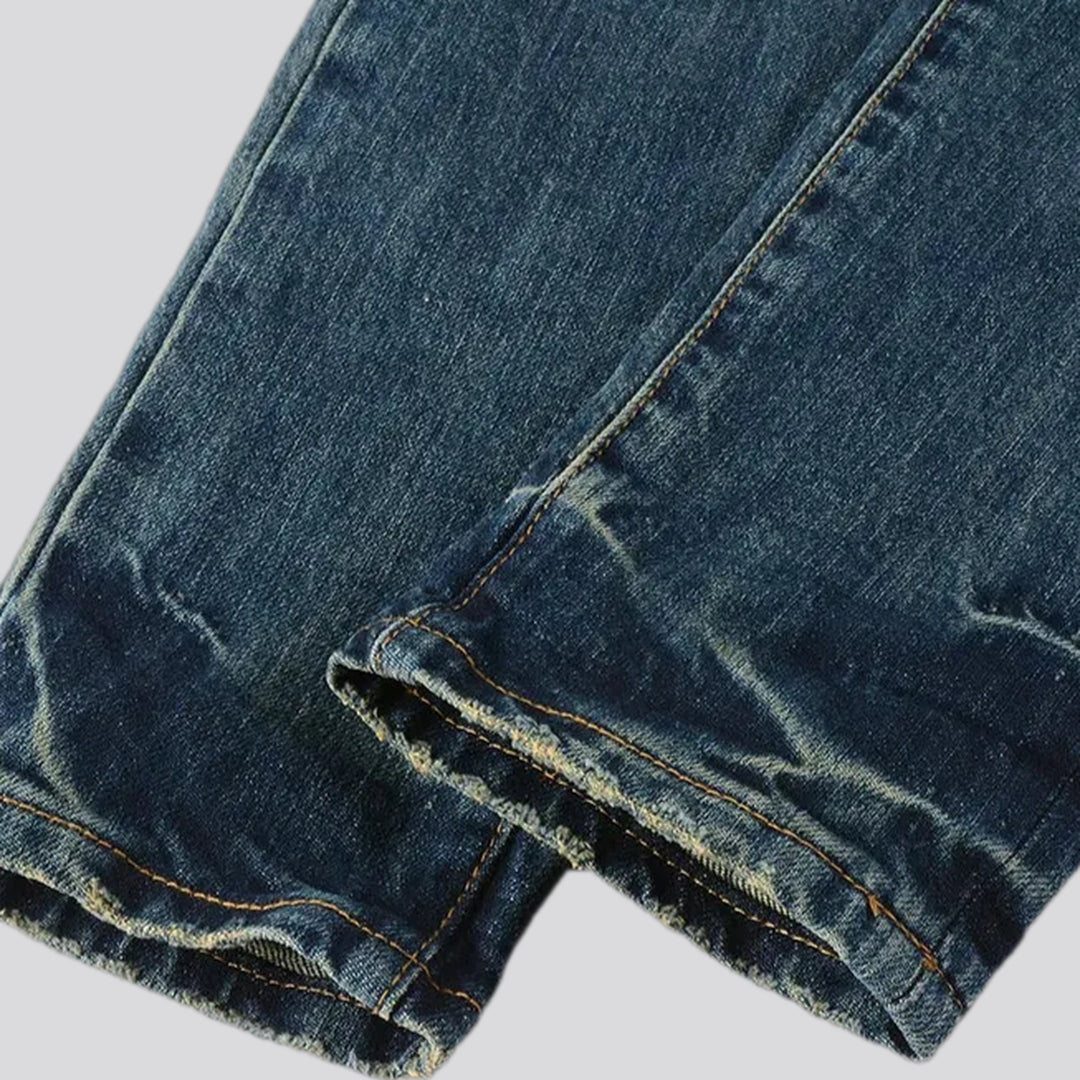 Distressed elastic men's jeans