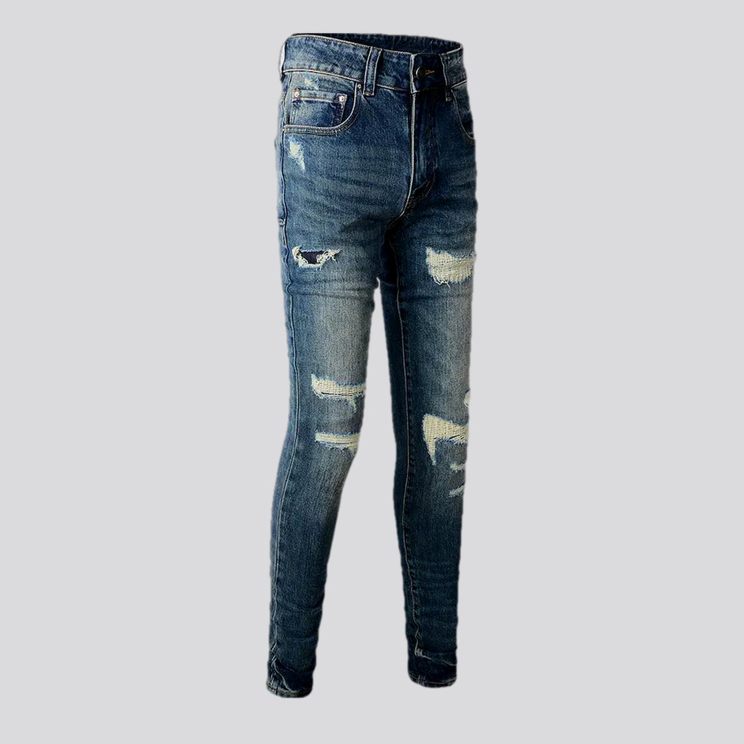 Distressed elastic men's jeans