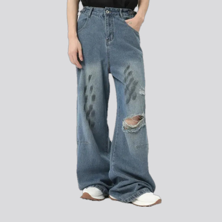 Ripped whiskered grunge jeans for men