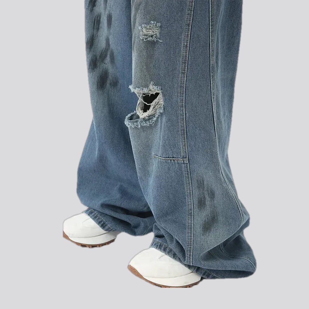 Ripped whiskered grunge jeans for men