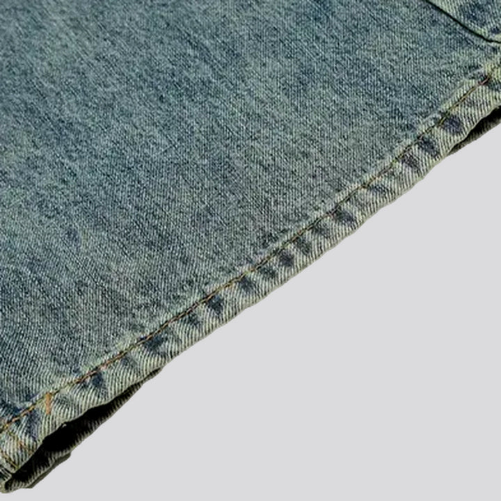 Baggy style and faded wash men's jeans