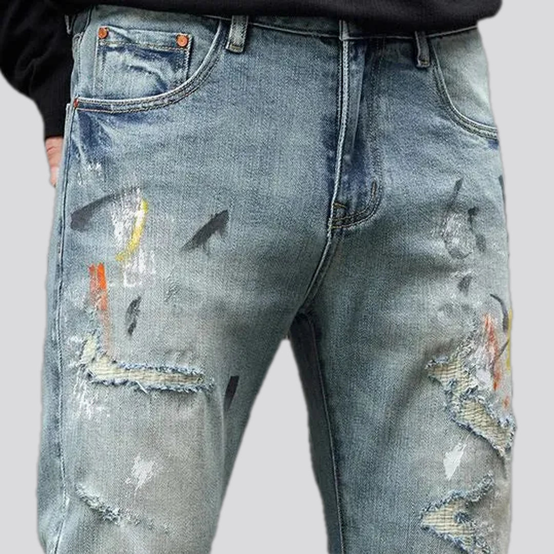 Distressed art style jeans for men