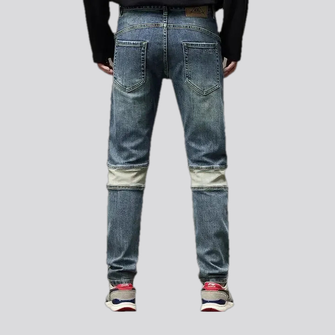 Fashionable distressed stretch men's jeans