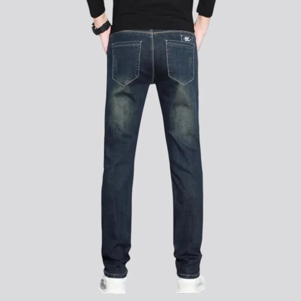 Fitted casual dark distressed jeans for men