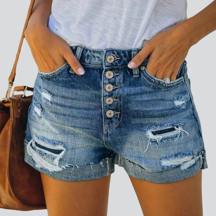 Distressed jeans shorts with buttons