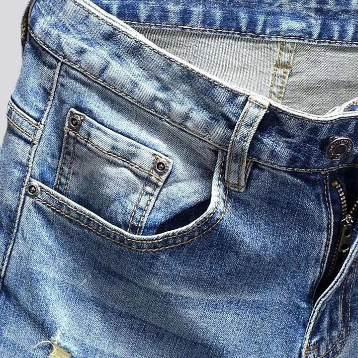 Light wash men's mid-waist jeans