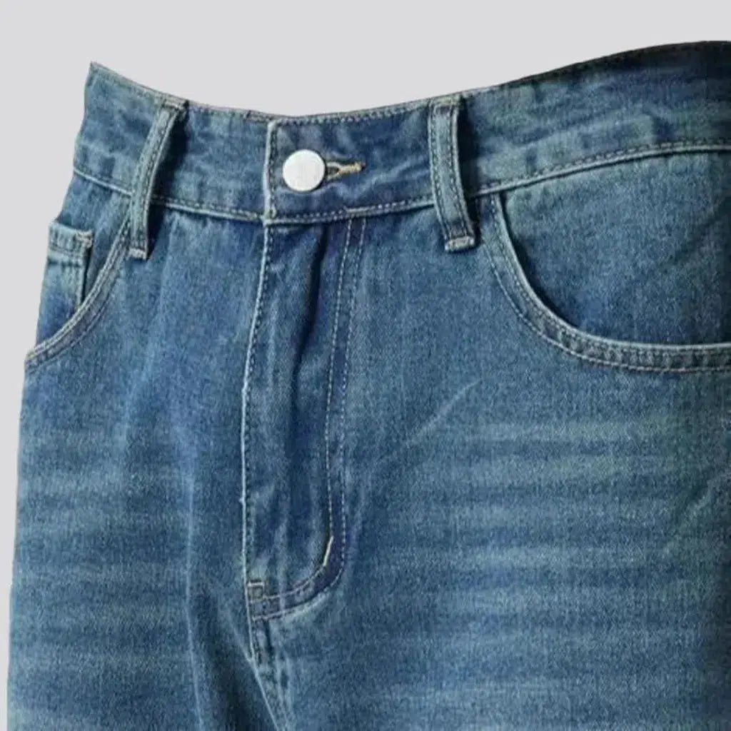 Medium-wash mid-waist jeans