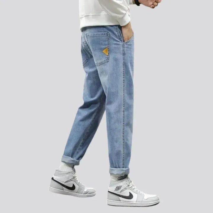 Sanded men's tall-waistline jeans