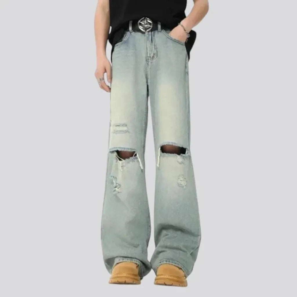 Washed out distressed jeans for men