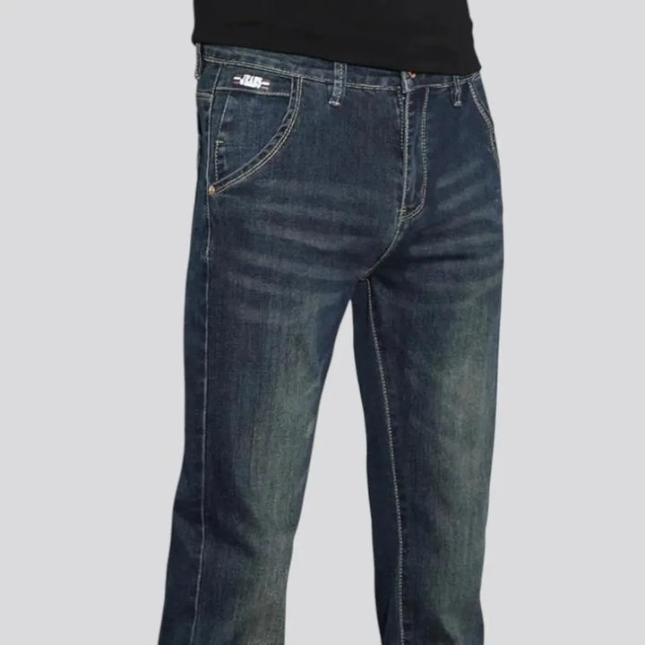 Mid rise elastic dark men's jeans