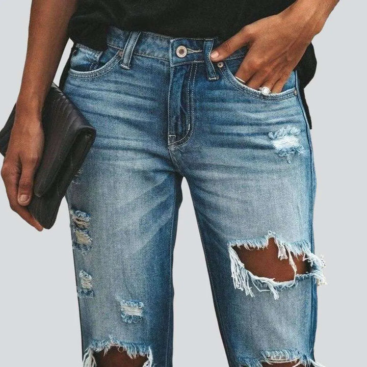 Light blue ripped women's jeans