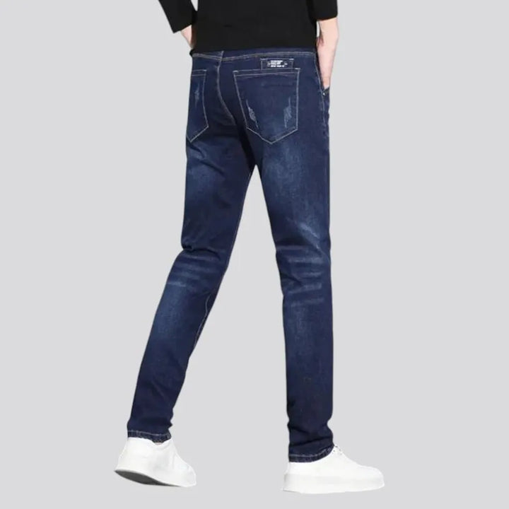 Fitted casual dark distressed jeans for men