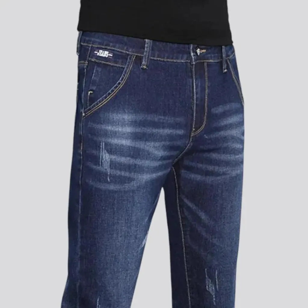 Fitted casual dark distressed jeans for men