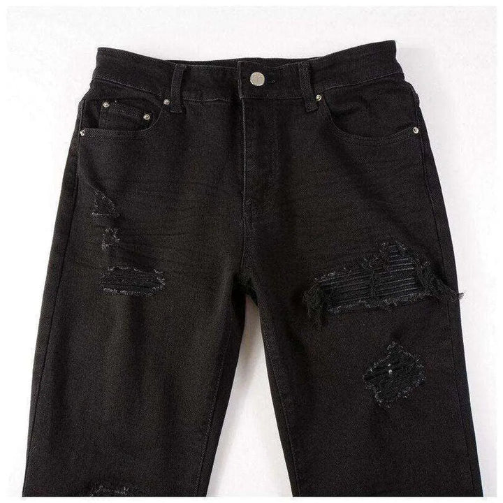 Black leather patch biker jeans