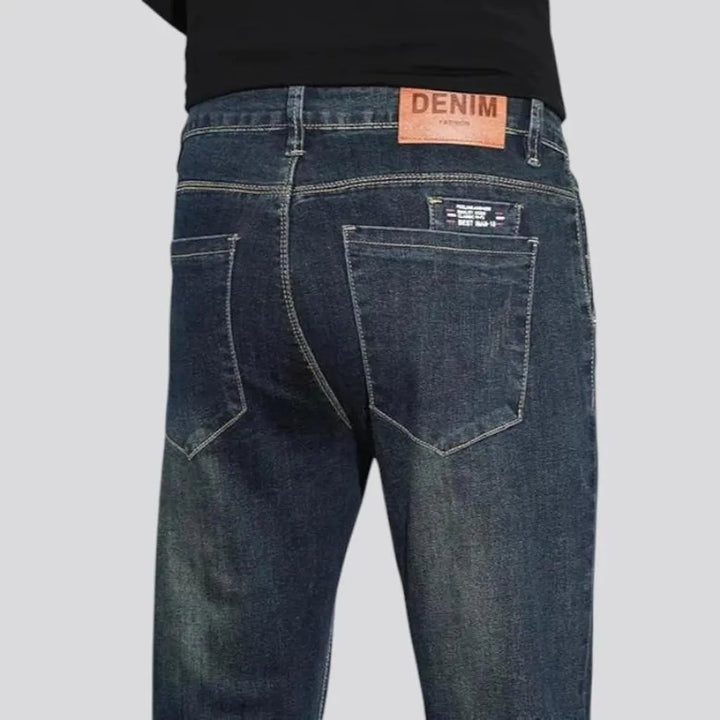 Fitted casual dark distressed jeans for men