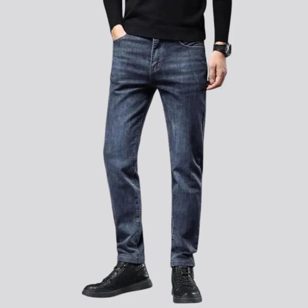 Elastic dark padded jeans for men