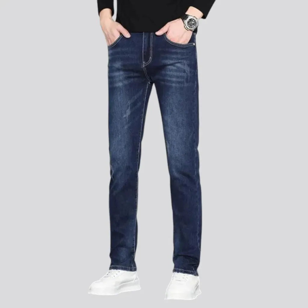 Dark slim-fitting casual men's jeans