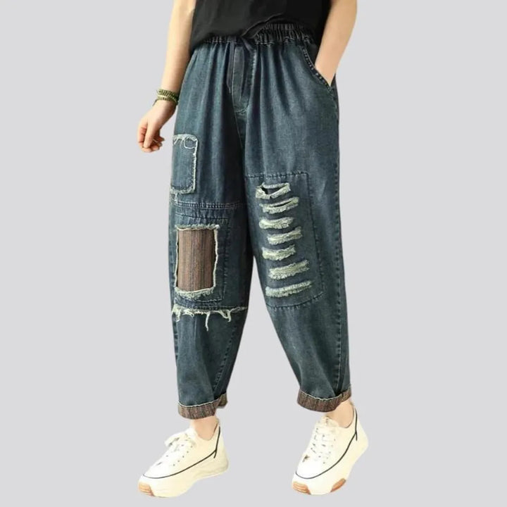 Embroidered distressed women's jean pants