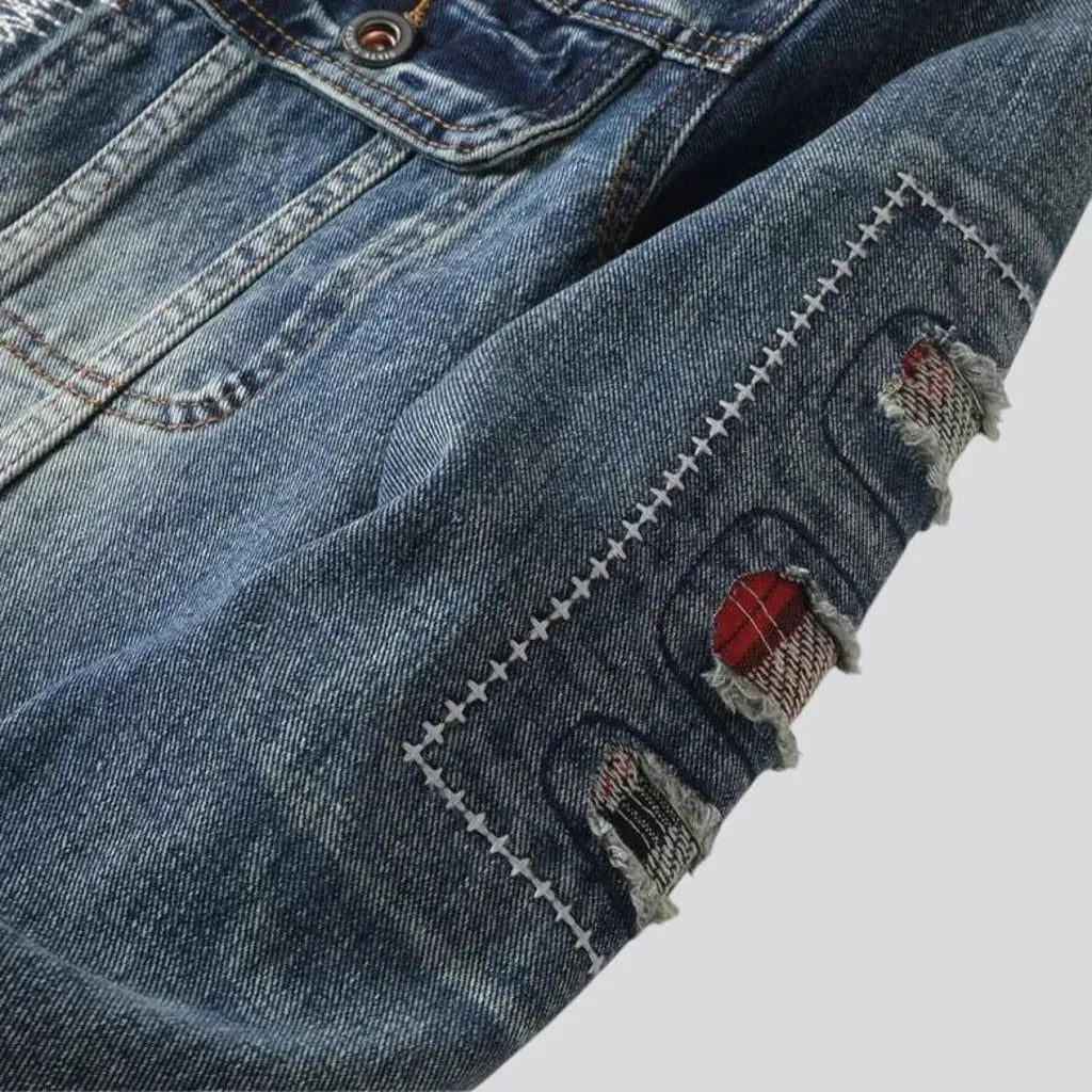 Distressed men's jean jacket