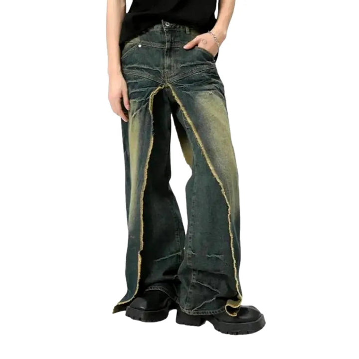 Distressed men's layered jeans