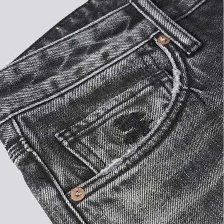 Grunge style vintage whiskered men's jeans