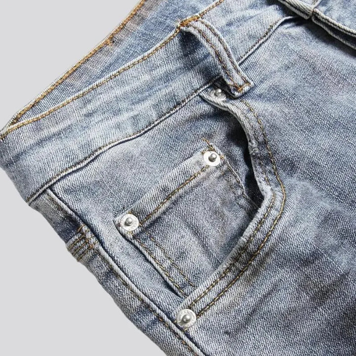 Paint-stains men's mid-waist jeans