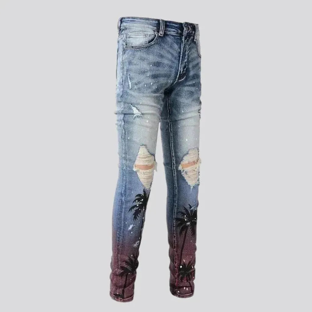 Distressed men's palms-print jeans