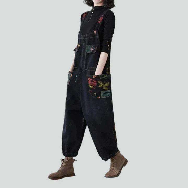 Black-painted women's denim dungaree