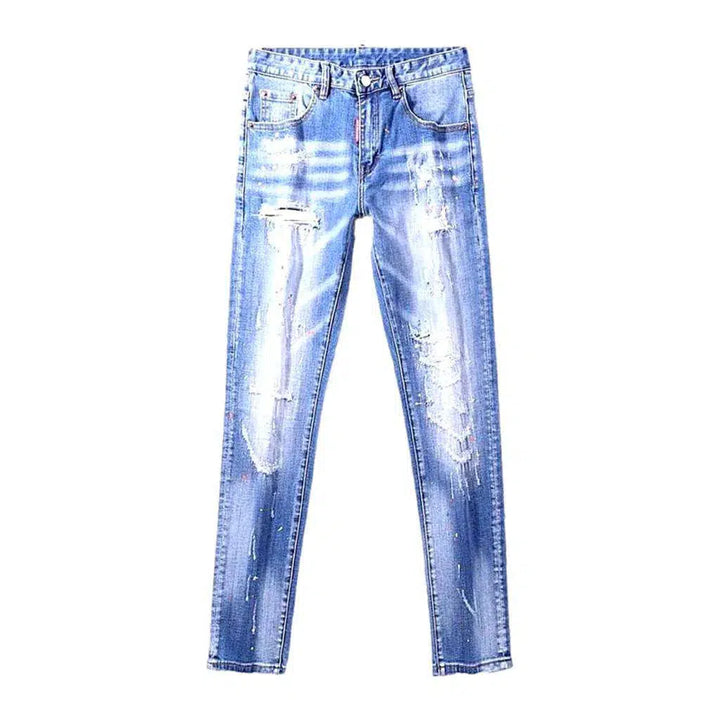 Grunge men's paint-splattered jeans