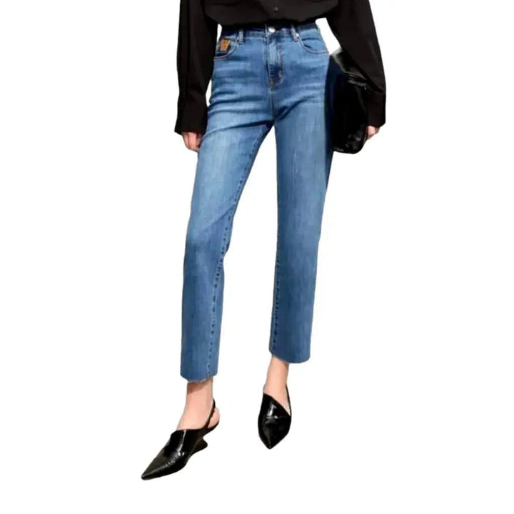 High-waist stonewashed jeans for women