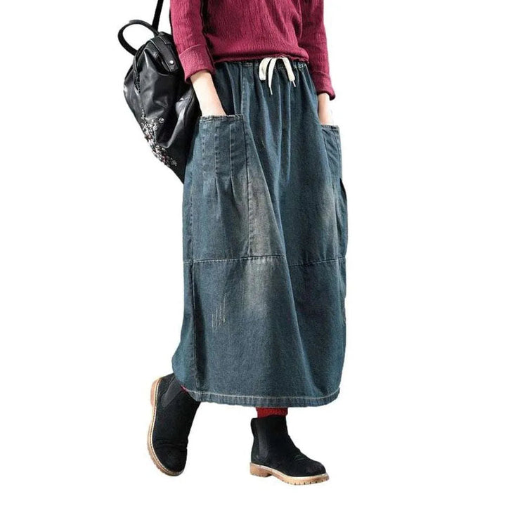 Long dark women's denim skirt