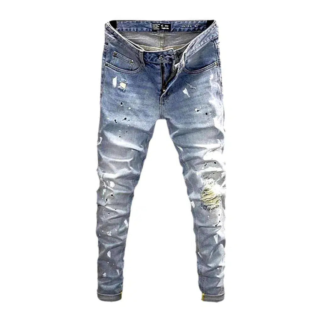 Ripped light men's wash jeans