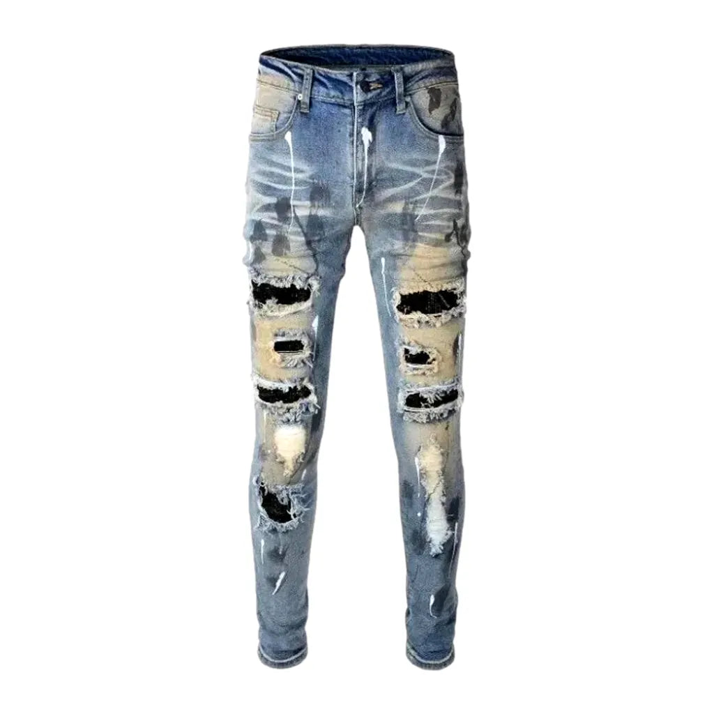 Whiskered crystal-patch jeans